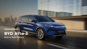 BYD Atto 3 electric SUV in a modern French city scene