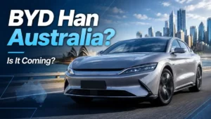 BYD Han electric sedan in Australia with a modern coastal city background